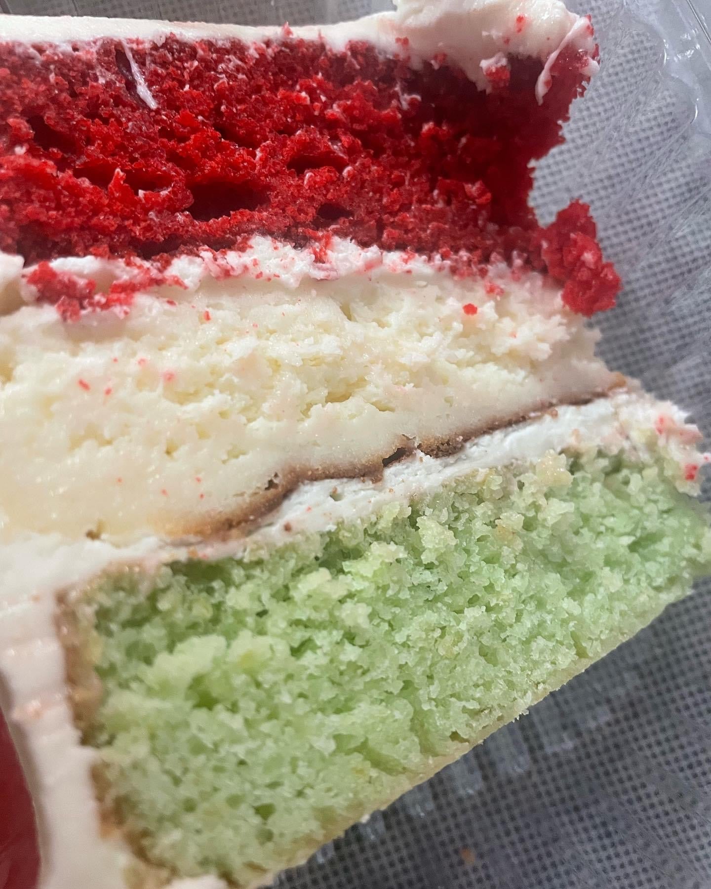 The GRINCH CHEESECAKE cake slice