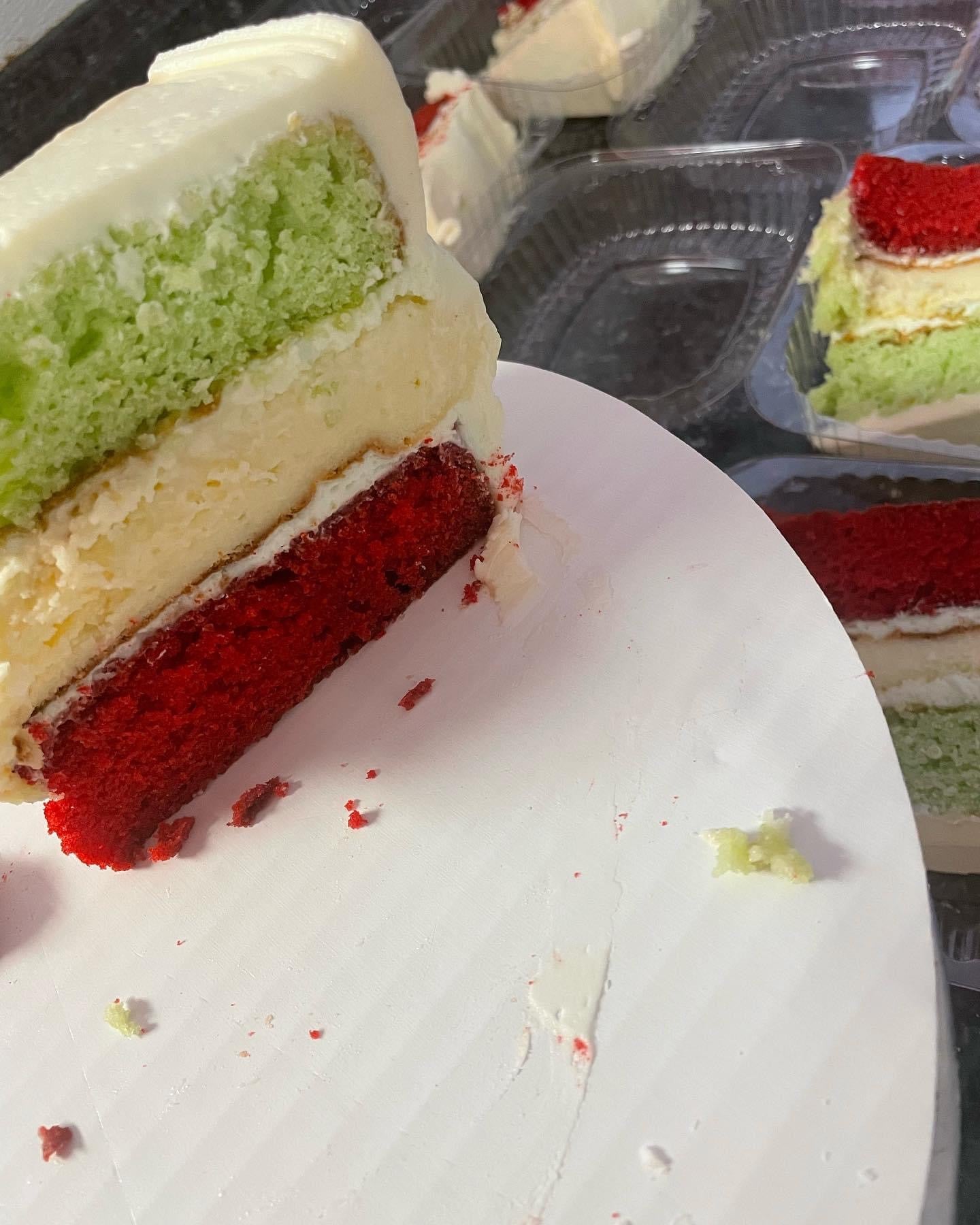 The GRINCH CHEESECAKE cake slice